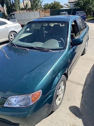 трактор мтз 89 1: Mazda Protege: 2002 г., Автомат, Бензин — 3
