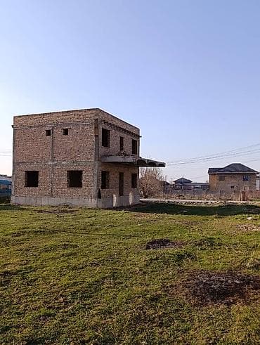 Продаётся кирпичный двухэтажный дом без внутренней отделки на участке