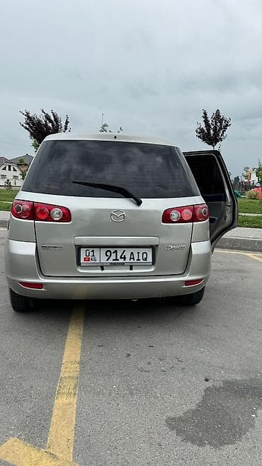 багаж на демио: Mazda Demio: 2004 г., 1.3 л, Автомат, Бензин, Хэтчбэк — 3