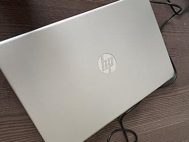 hp 15: Ноутбук HP, серебристый корпус. Характеристики по фото: - Экран около — 6