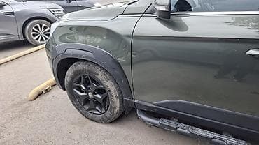 kia bango: SsangYong Khan — полноразмерный пикап цвета хаки с жестким кунгом — 6