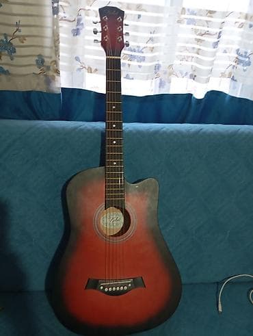 Акустическая гитара с вырезом (cutaway), форма корпуса типа дредноут at lalafo.kg Акустическая гитара с вырезом (cutaway), форма корпуса типа дредноут