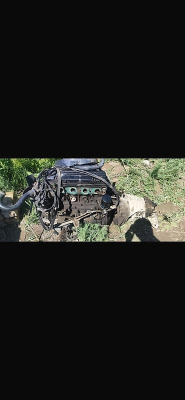 Детали двигателя и моторы в сборе: Двигатель в сборе с навесным и коробкой передач. Описание: - Рядный — 1