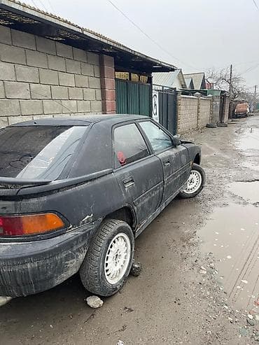 8: Mazda 323: 1991 г., 1.8 л, Механика, Бензин — 4