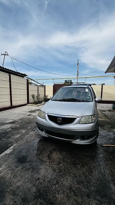 Транспорт: Mazda : 2003 г., Кол менен иштөөчү, Бензин — 7