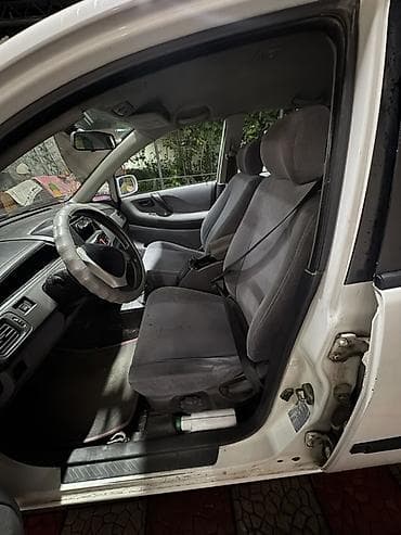 даево такума: Suzuki Liana: 2002 г. — 7