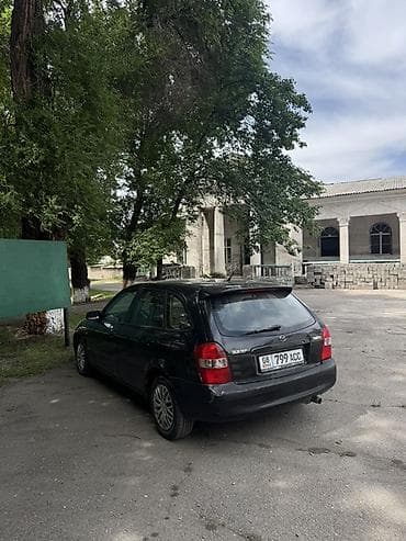 вампер 124: Mazda 323: 2001 г., 1.6 л, Механика, Бензин, Универсал — 3