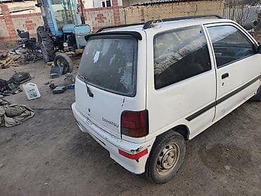 Унаа: Daihatsu Cuore: 1994 г., Кол менен иштөөчү, Бензин, Хетчбек — 4