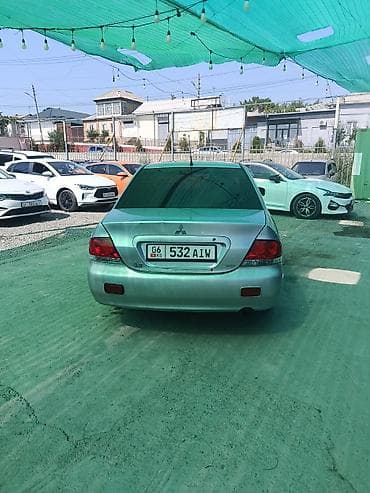 mazda mx: Mitsubishi Lancer: 2004 г., 1.6 л, Автомат, Бензин, Седан — 5