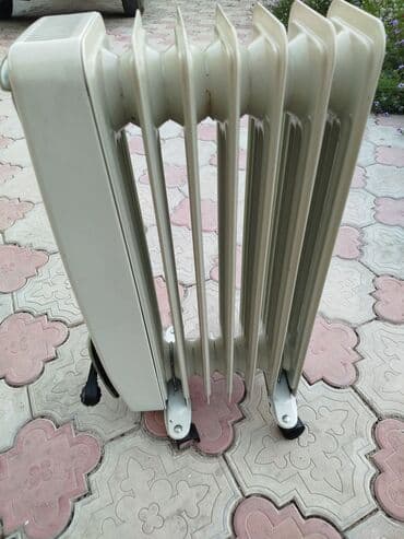 утюг polaris pir 2855a: Масляный обогреватель Polaris, Кол-во секций: 7, Несколько режимов мощности — 4