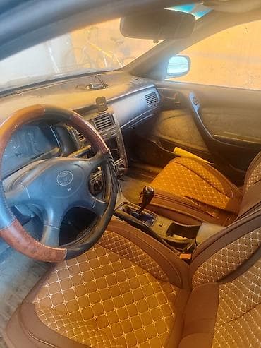 салквн тор: Toyota Carina E: 1995 г., Механика, Бензин, Седан — 7