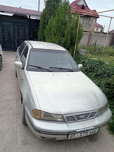 кен булун: Daewoo Nexia: 2004 г., Седан — 2