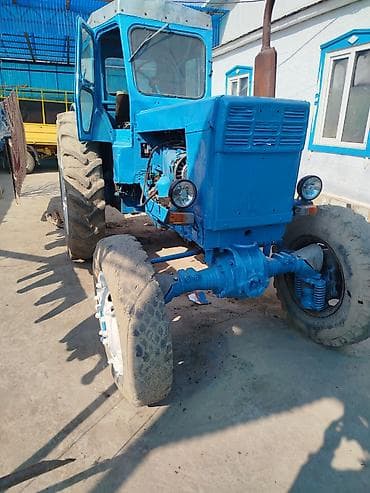 Трактор колесный, класс 1,4–2,0 тс, окраска синим цветом. Кабина at lalafo.kg Трактор колесный, класс 1,4–2,0 тс, окраска синим цветом. Кабина
