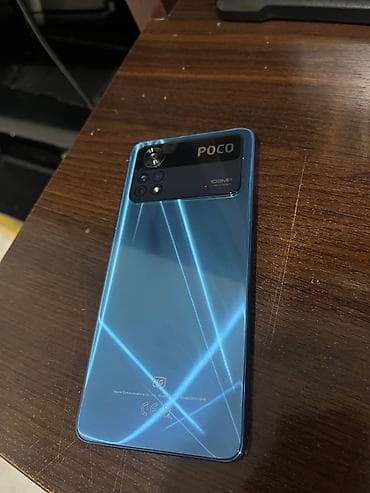 POCO смартфон, модель 2201116PG (серия с 5G). Цвет — синий с глянцевым — 1