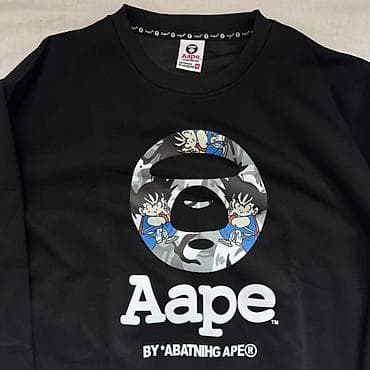 Свитшот AAPE BY A BATHING APE - Цвет: черный - Принт: фирменный