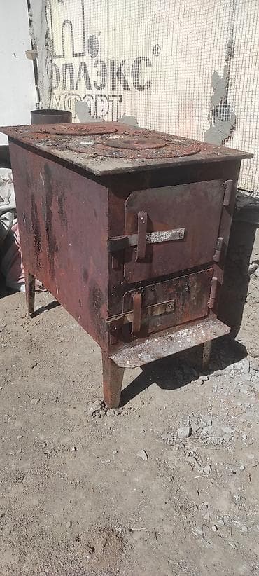 Металлическая дровяная печь-буржуйка с варочной плитой. - Материал