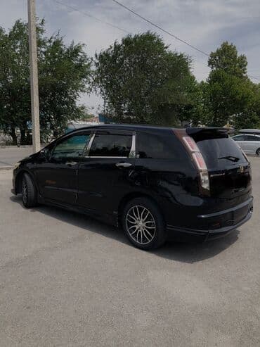 бу аккумулятор авто: Honda Stream: 2009 г., 2 л, Автомат, Бензиновая, Минивэн — 10