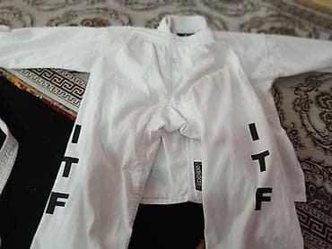 Мужская одежда: Белое кимоно для тхеквондо, носили несколько раз почти новая. Подходит — 4