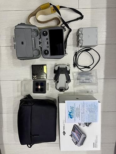 DJI Mini 4 Pro Fly More Combo с пультом DJI RC 2 и комплектом