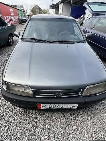тез арада: Nissan Primera: 1991 г., 1.6 л, Кол менен иштөөчү, Бензин, Седан — 10