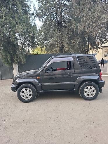рулевая рейка митсубиси поджеро: Mitsubishi Pajero Junior: 1998 г., 1.1 л, Автомат, Бензин, Внедорожник — 3