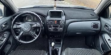 lada 2113: Nissan Almera: 2006 г., 1.5 л, Механика, Бензин, Хэтчбэк — 9