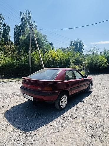 т макс скутер: Mazda 323: 1994 г., 1.6 л, Механика, Бензин, Хэтчбэк — 4