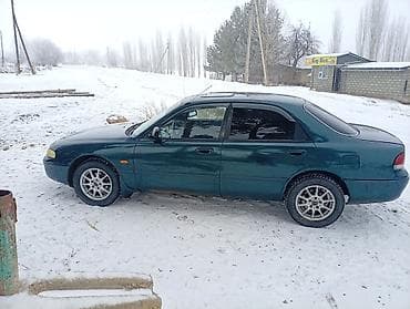 step spada: Mazda 626: 1993 г., 1.8 л, Механика, Бензин, Седан — 3