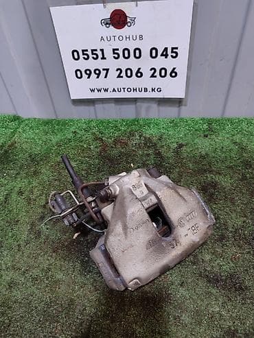 Суппорт передний для Volkswagen Passat B5+ (рестайлинг), двигатель 2.0