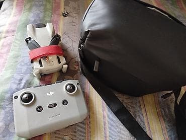 DJI Mini 3 (серия Mini, складной квадрокоптер) с пультом DJI RC-N1 и