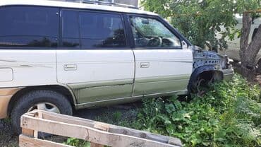 Переднее левое Mazda, 1996 г., Б/у, Оригинал