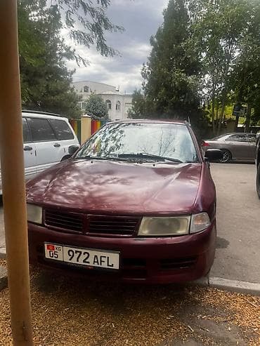 Mitsubishi Lancer: 1998 г., 1.3 л, Автомат, Бензин, Седан
