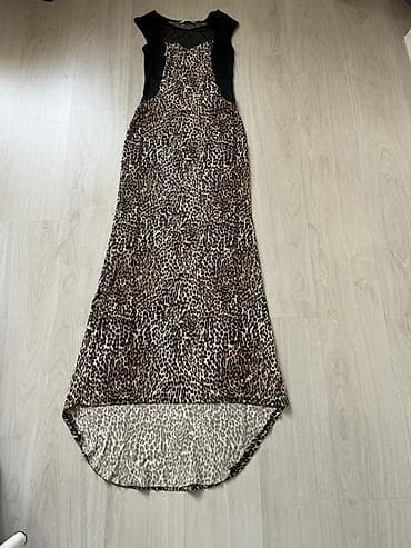 платья леопардовая: Платье с леопардовым принтом и контрастными чёрными вставками. - — 1
