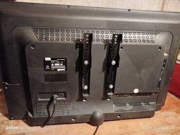 телевизор 32 дюйма цена: Телевизор TCL, модель LED32S3900. На задней панели имеются крепления — 2