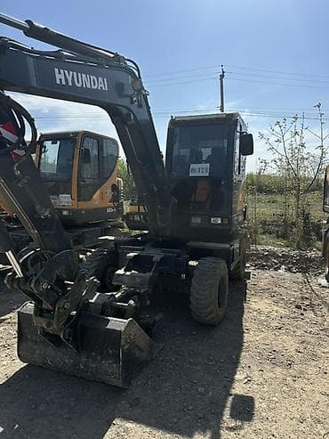 daf 95xf: Экскаватор, Hyundai, Колесный — 2