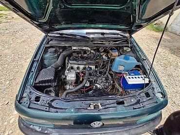 Унаа: Volkswagen Passat: 1994 г., 1.8 л, Кол менен иштөөчү, Бензин, Универсал — 4