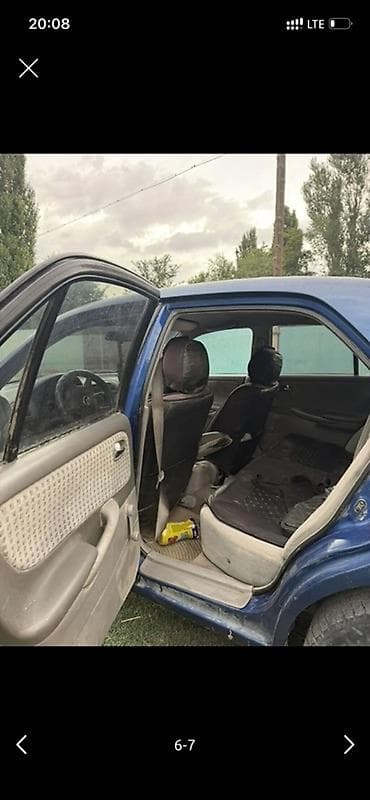 aion авто: Mazda 626: 2000 г., Седан — 6