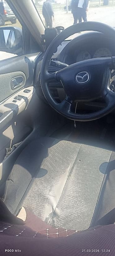 chery tiggo: Mazda 323: 2003 г., 1.6 л, Ручные, Бензин, Хэтчбэк — 5