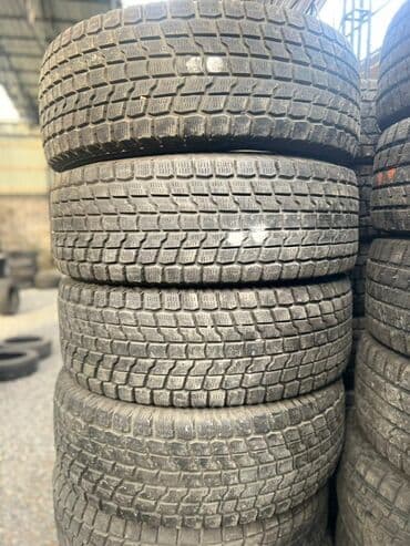 шины на форанер: Шины 285 / 60 / R 18, Зима, Комплект, Легковые, Япония, Bridgestone — 1