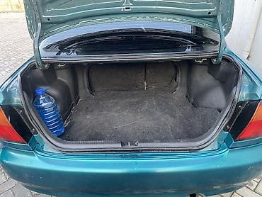 rx 590: Mazda 323: 1996 г., 1.6 л, Автомат, Газ, Седан — 7