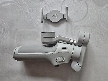 превья: Стабилизатор для смартфона DJI OM (серия Osmo Mobile 7) с футляром - — 1