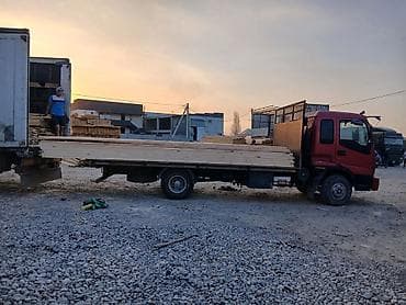 Услуги грузоперевозок на бортовом грузовике - Бортовой автомобиль с