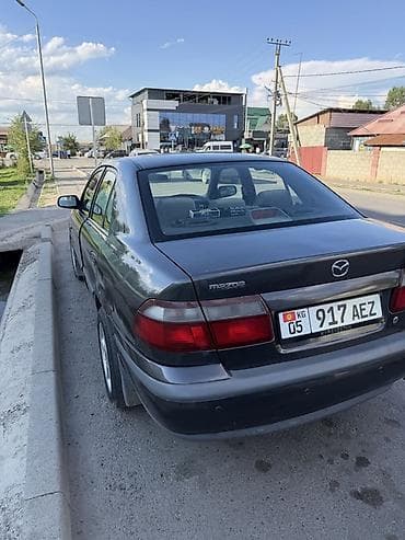 Унаа: Mazda 626: 1999 г., 2 л, Кол менен иштөөчү, Бензин, Седан — 3