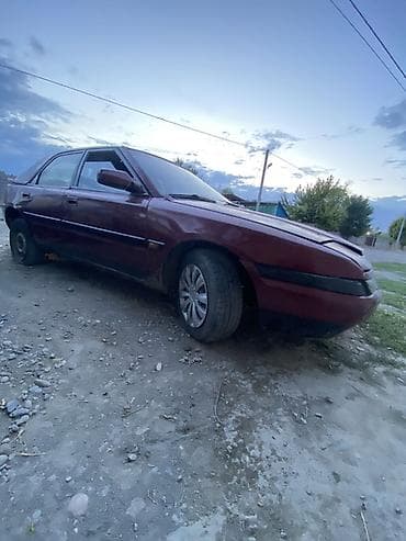 гак айон с: Mazda 323: 1994 г., 1.8 л, Механика, Бензин, Хэтчбэк — 5