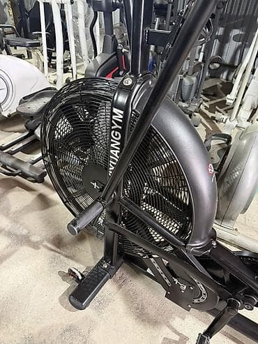 Спорт жана хобби: Воздушный велотренажёр (air bike) с рычагами для одновременной работы — 2