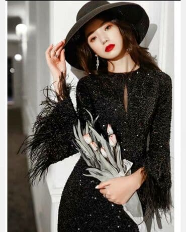 платье с пайетками большого размера: Черное вечернее платье с перьями
хорошо сидит по фигуре — 5