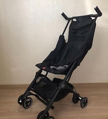 Детские электрокары: Коляска, цвет - Черный, Б/у — 1