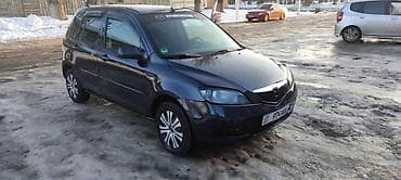 Транспорт: Mazda 2: 2004 г., 1.3 л, Кол менен иштөөчү, Бензин, Хетчбек — 5