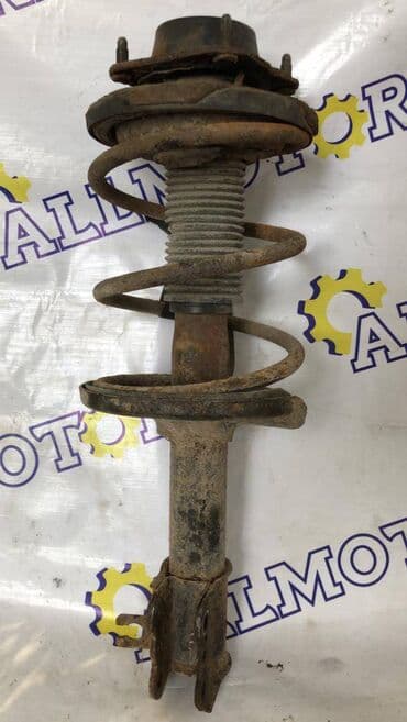 кровать с подъемным механизмом: Алдыңкы амортизатор Mazda — 1