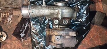 Автокосметика: Продам заводскую б/у турбину в хорошем состоянии на запчасти на Мазда — 4